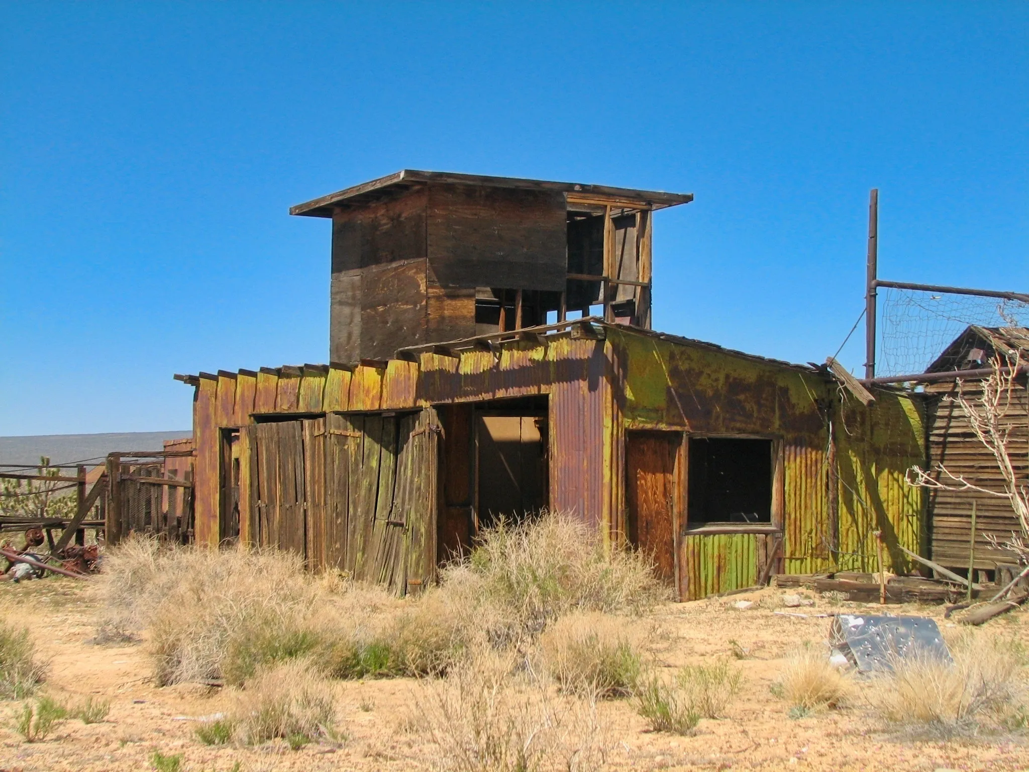 Abandoned corrugated-metal and wood buildings at the Death Valley Mine, Mojave Desert, California.