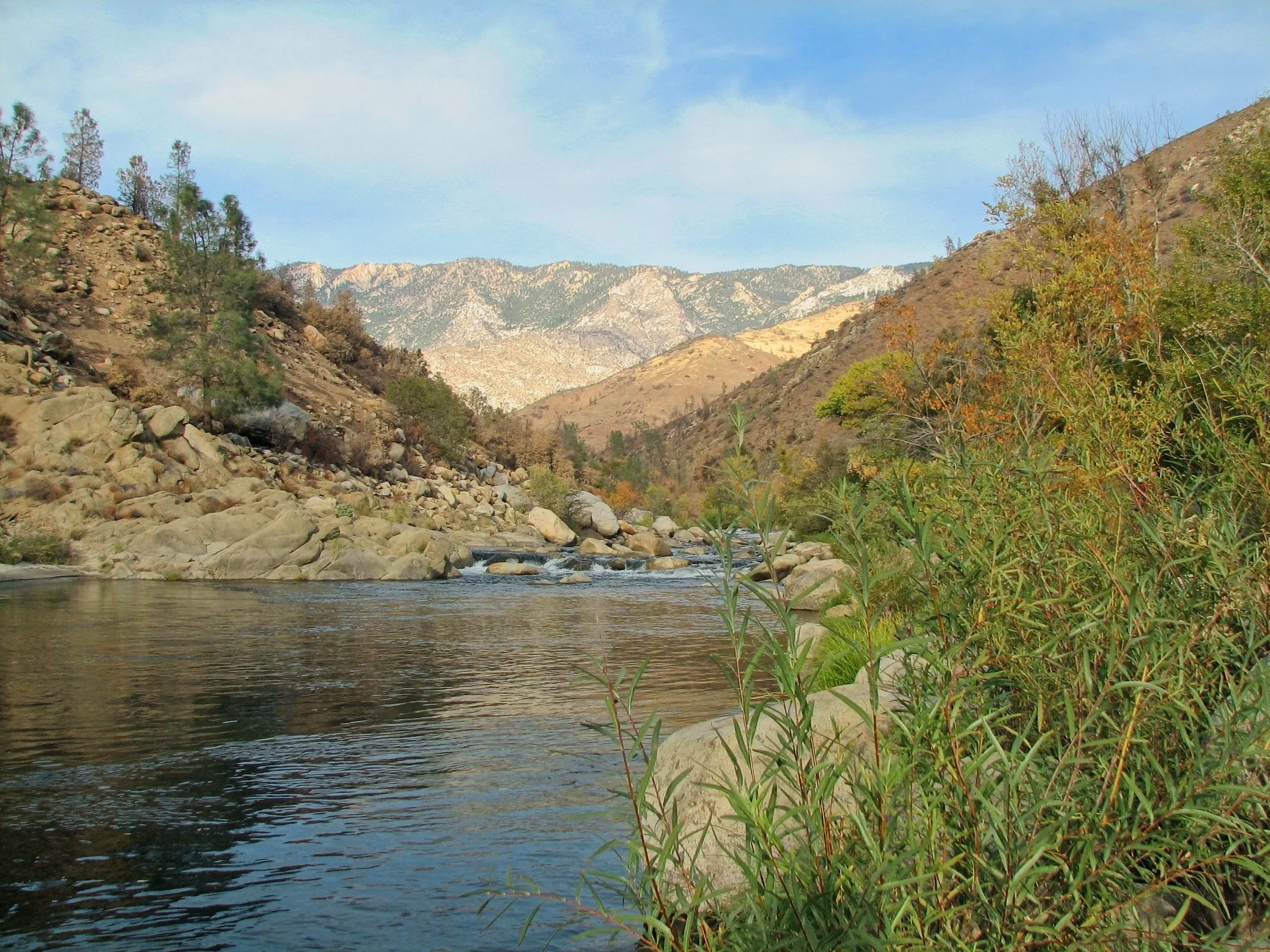 Kern River flowing over rocks between steep canyon walls.