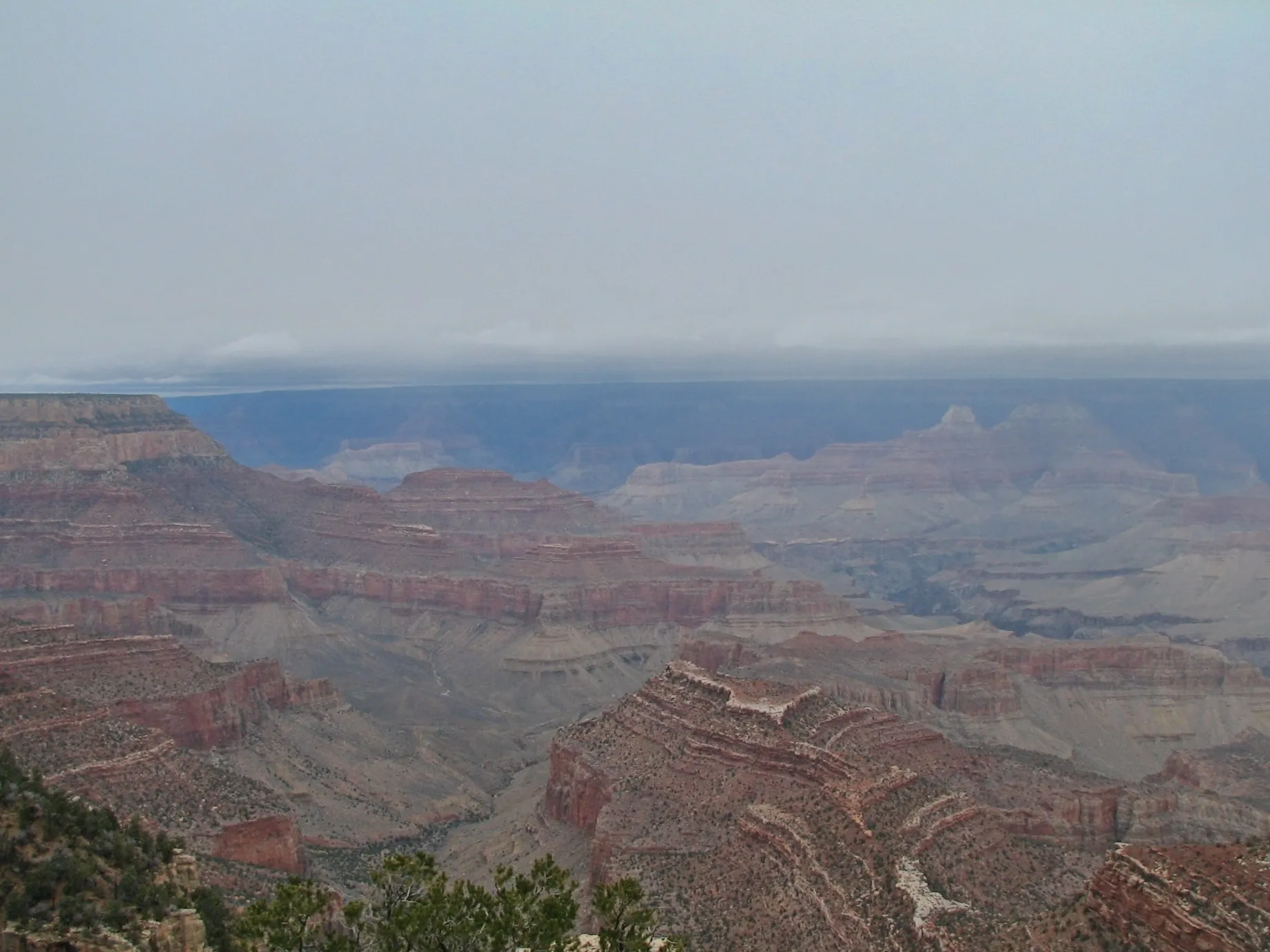 Layered rock formations at Grandview Point under an overcast sky, Grand Canyon, Arizona.