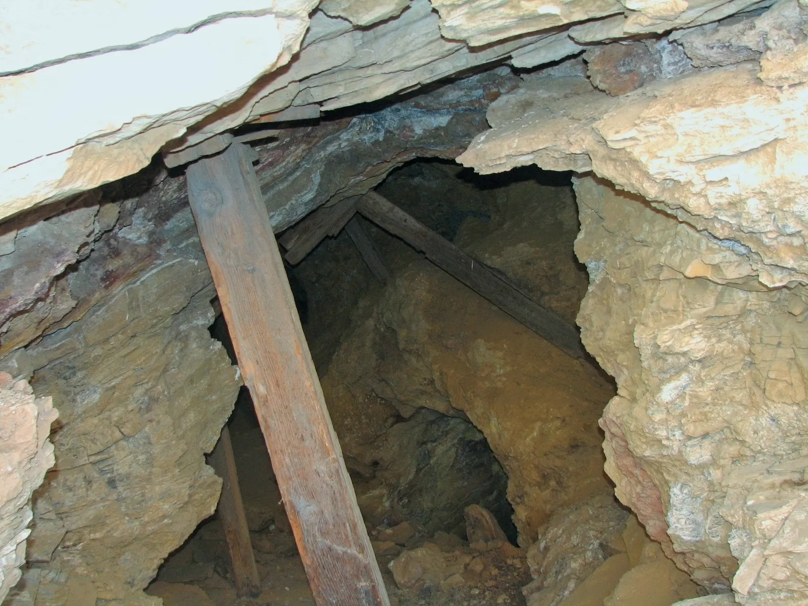 Timber supports in a narrow abandoned mine passage, Big Maria Mountains Wilderness.