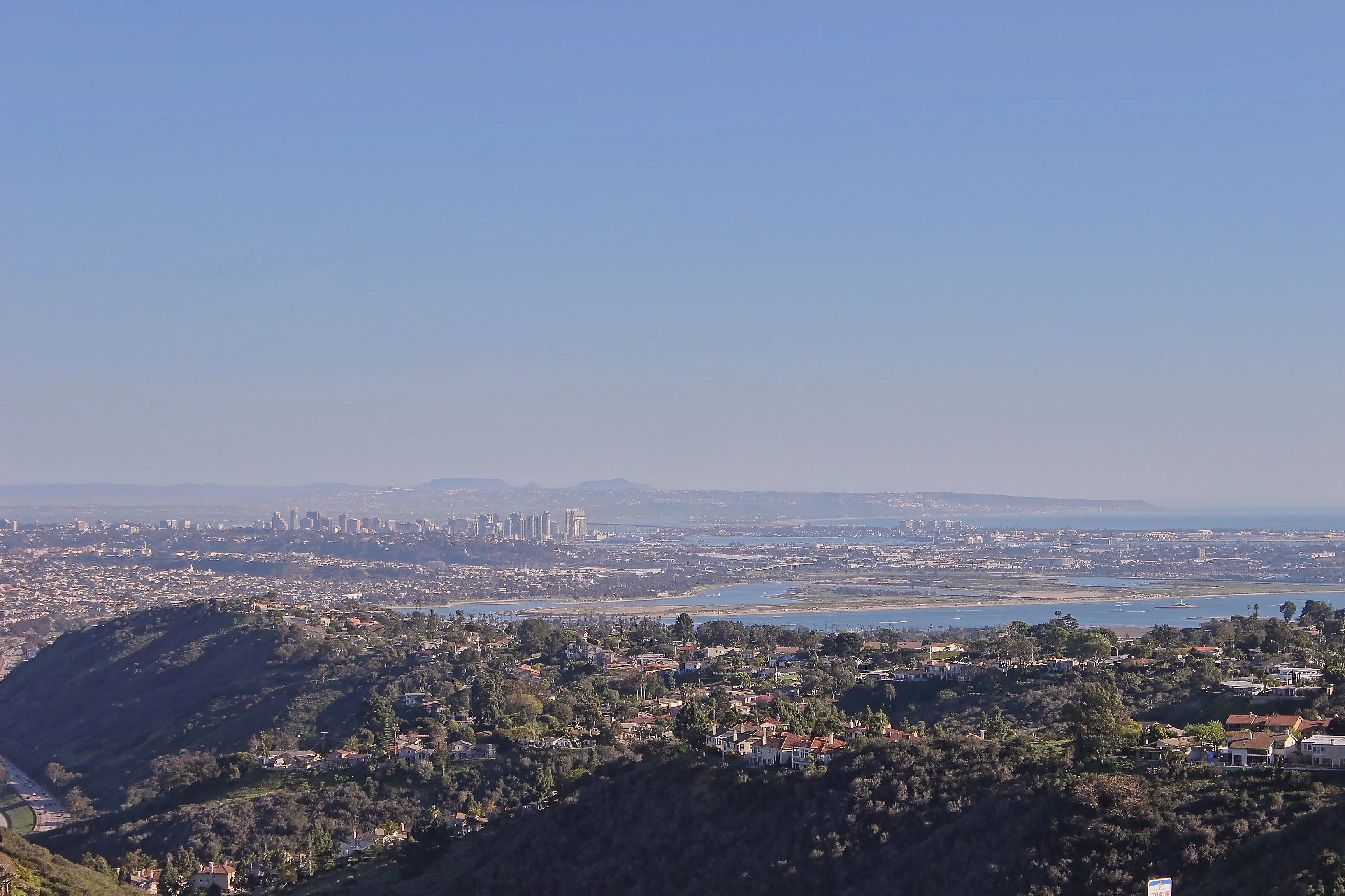 Downtown San Diego skyline and Mission Bay from Mount Soledad in San Diego, CA.