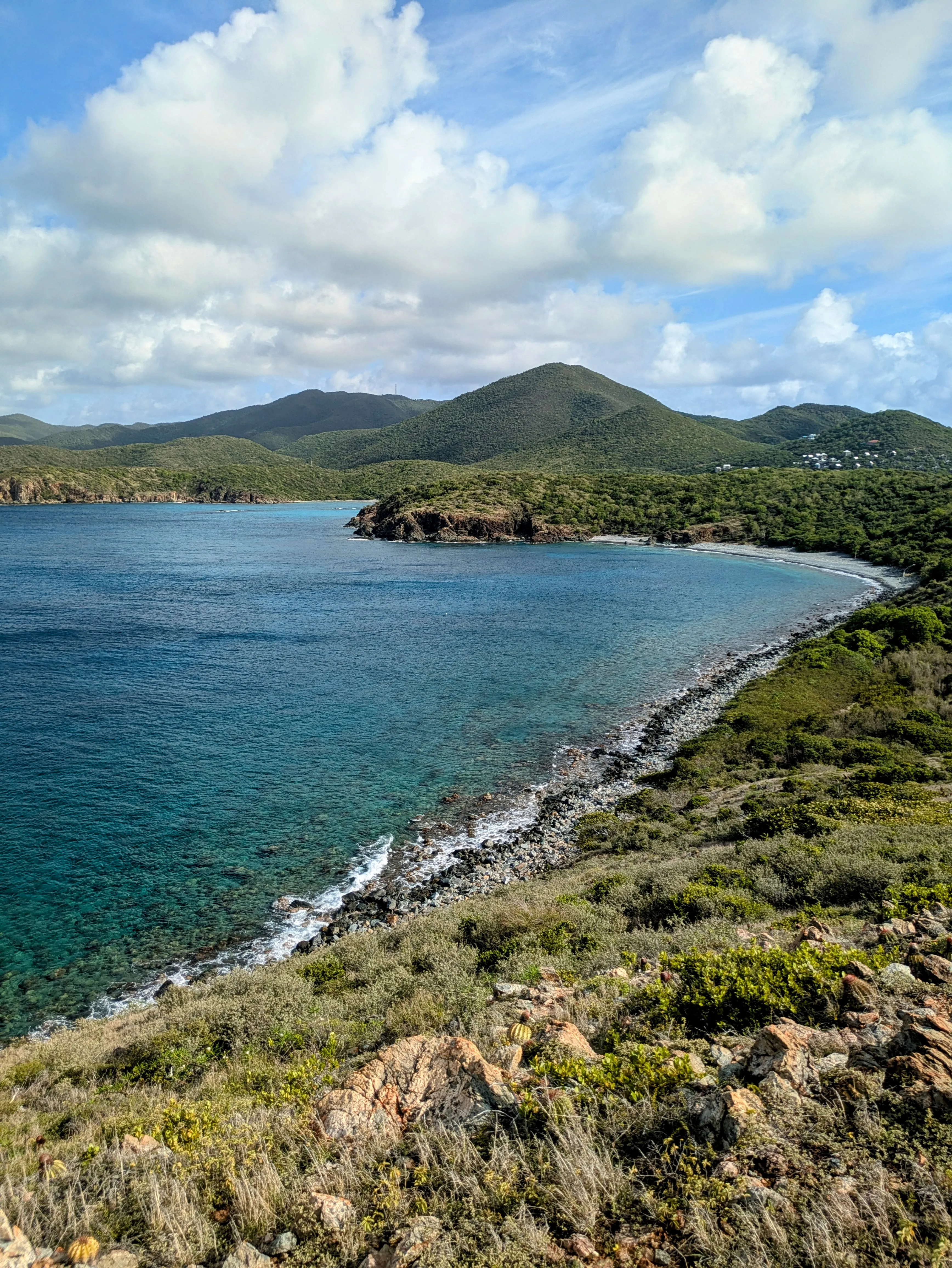 Turquoise bay and green hills viewed from Ram Head Trail on Saint John, USVI.